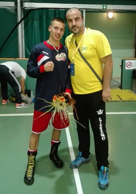 Емирджан Мехмед и треньорът му Людмил Димитров