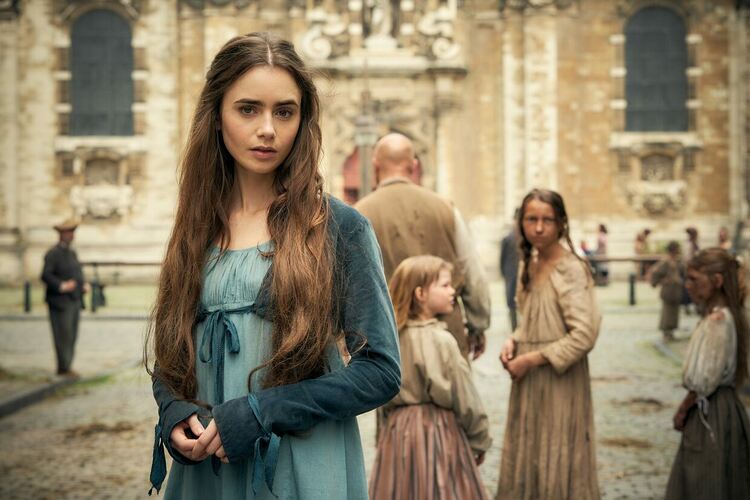 Epic Drama представя ТВ адаптацията на КЛЕТНИЦИТЕ с Доминик Уест и Лили Колинс